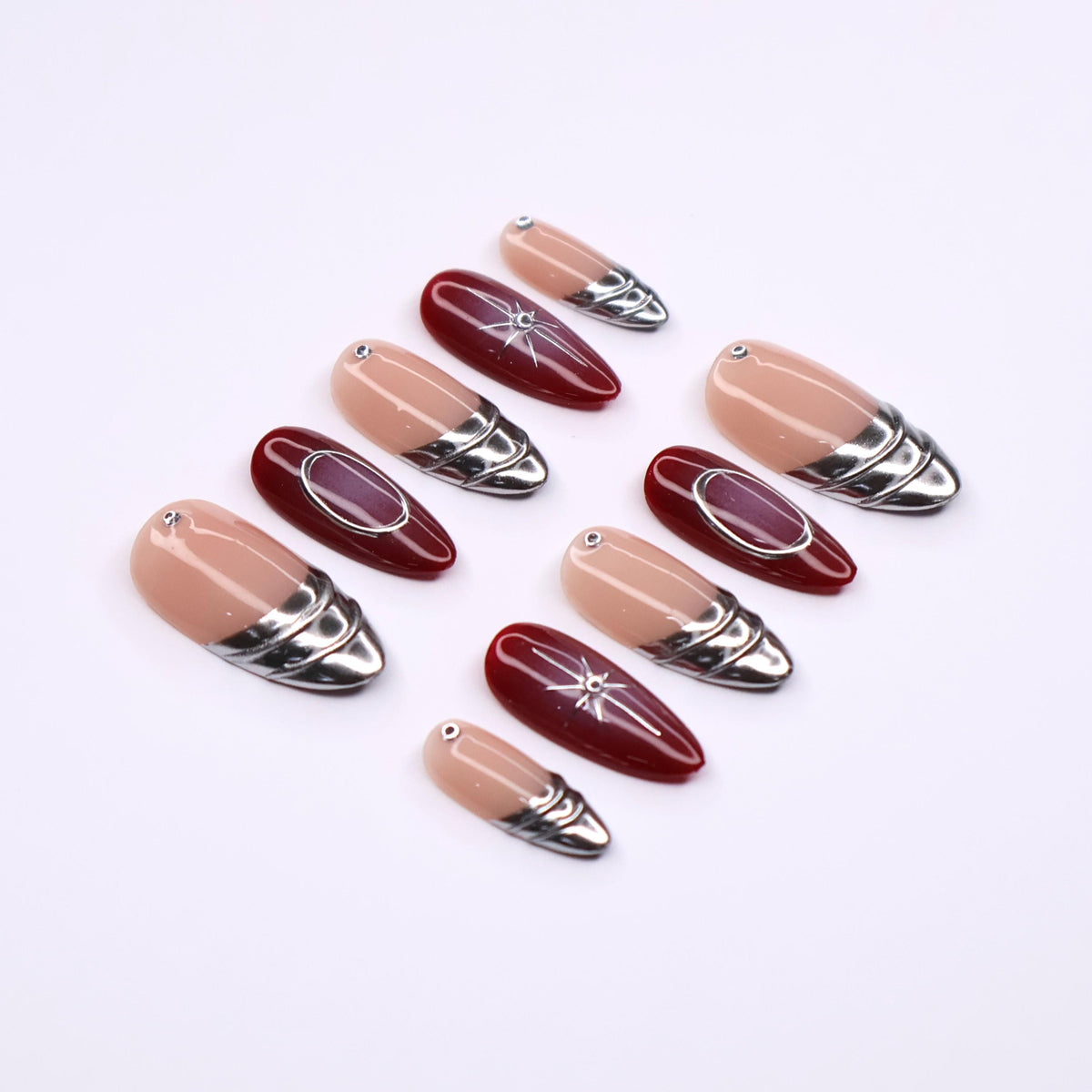Nude Pink and Burgundy Nails with Silver Chrome Bands and Celestial Details