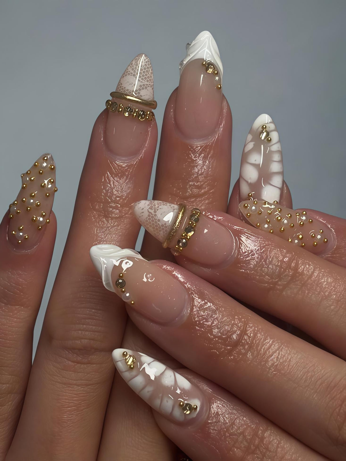Nude Pink and White Honeycomb Nails with Gold Beads and Raised Bands