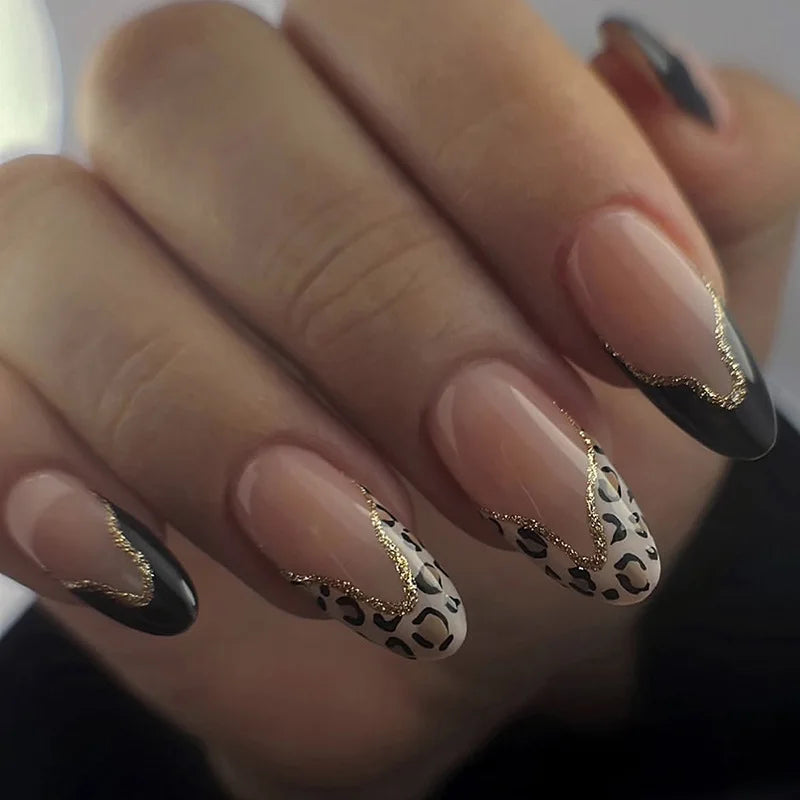 Nude Pink French Tip Nails with Black Leopard Spots and Gold Glitter Edging
