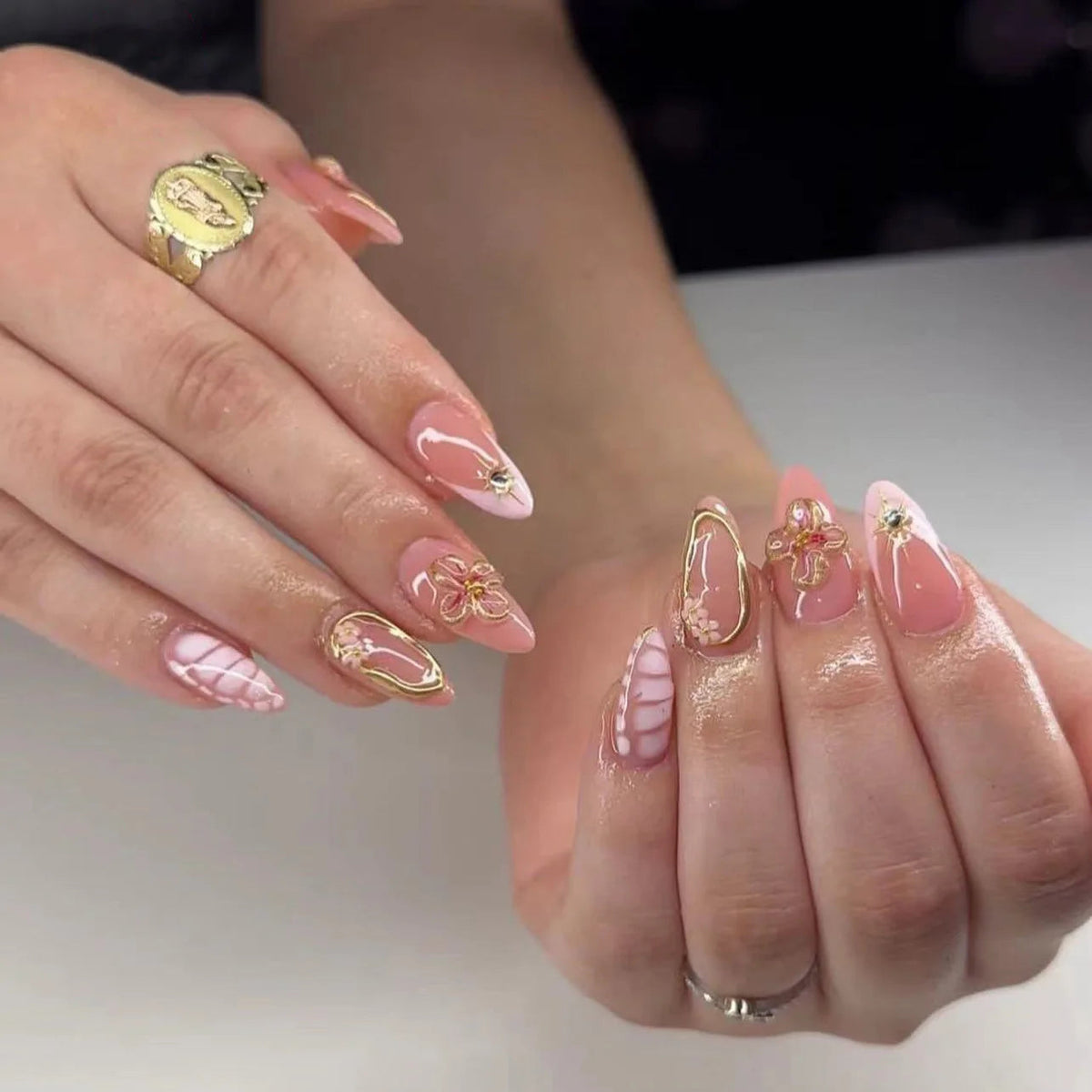 Nude Pink French Tip Nails with Ornate Gold Floral Details