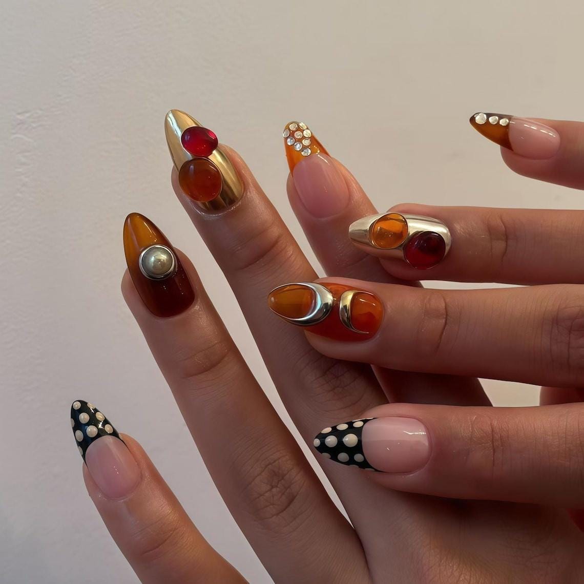 Nude Pink French Tip Nails With Polka Dots, Amber Cabochons and Silver-Tone Frames