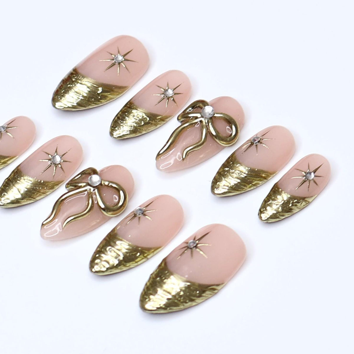 Nude Pink Nails with Textured Gold French Tips, Starbursts & 3D Bows