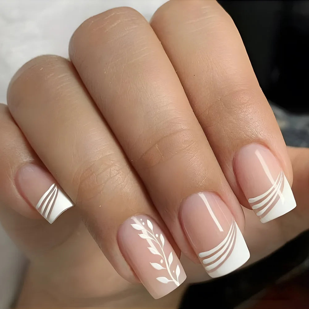 Nude Pink Swirl French Tip Press On Nails With White Leaf Accent