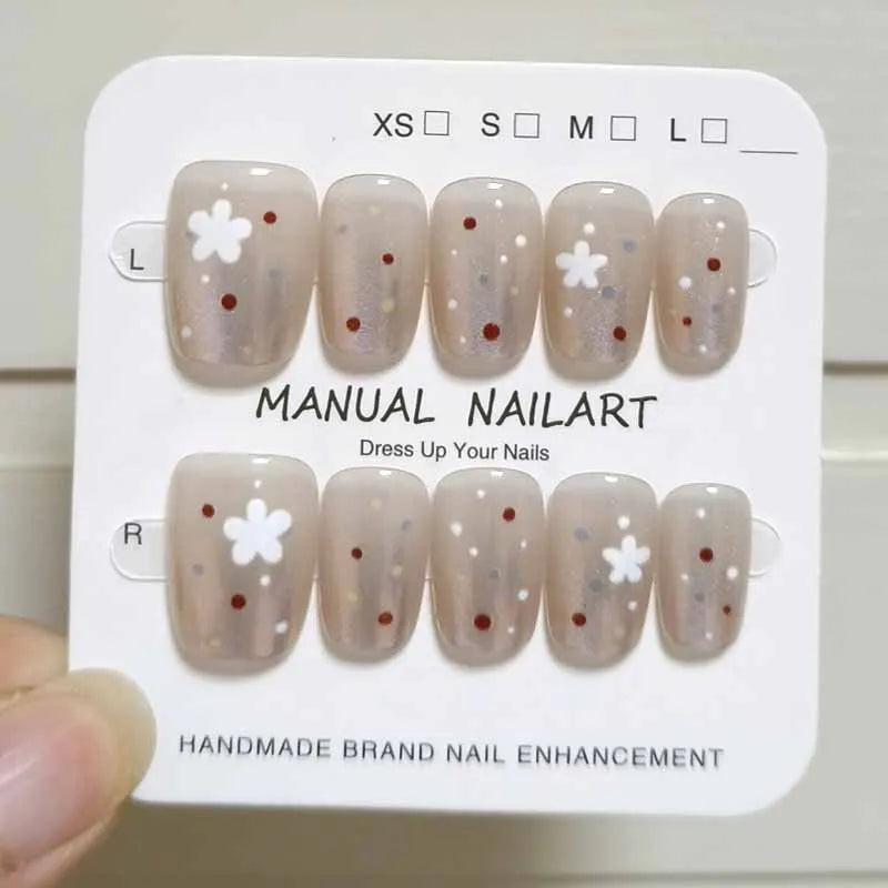 Nude Press On Nails With White Flowers and Polka Dots