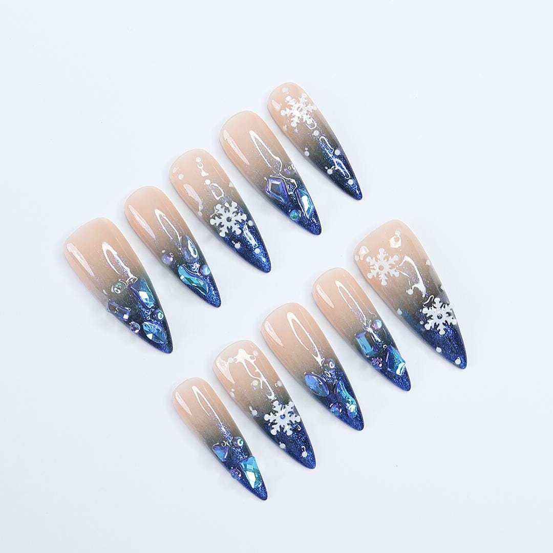 Nude-to-Navy Christmas Snowflake Press-On Nails With Blue Gems