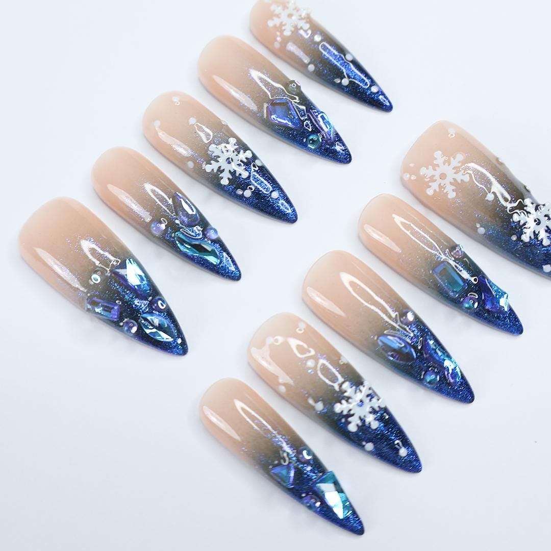 Nude-to-Navy Christmas Snowflake Press-On Nails With Blue Gems
