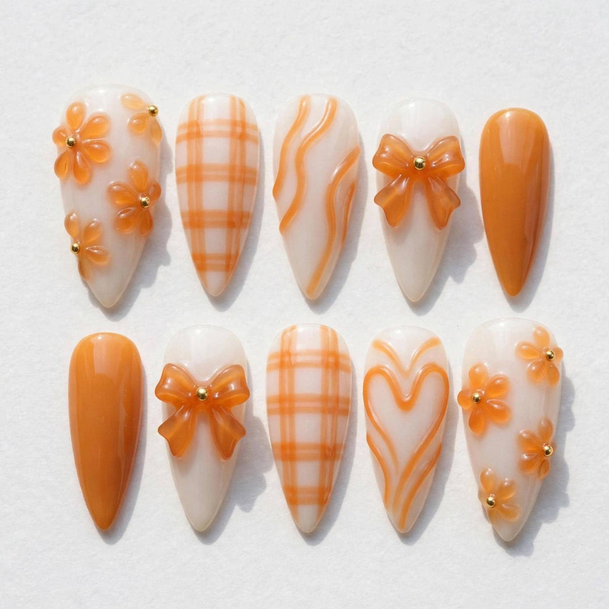 Orange 3D Flower and Bow Press On Nails with Plaid and Swirls