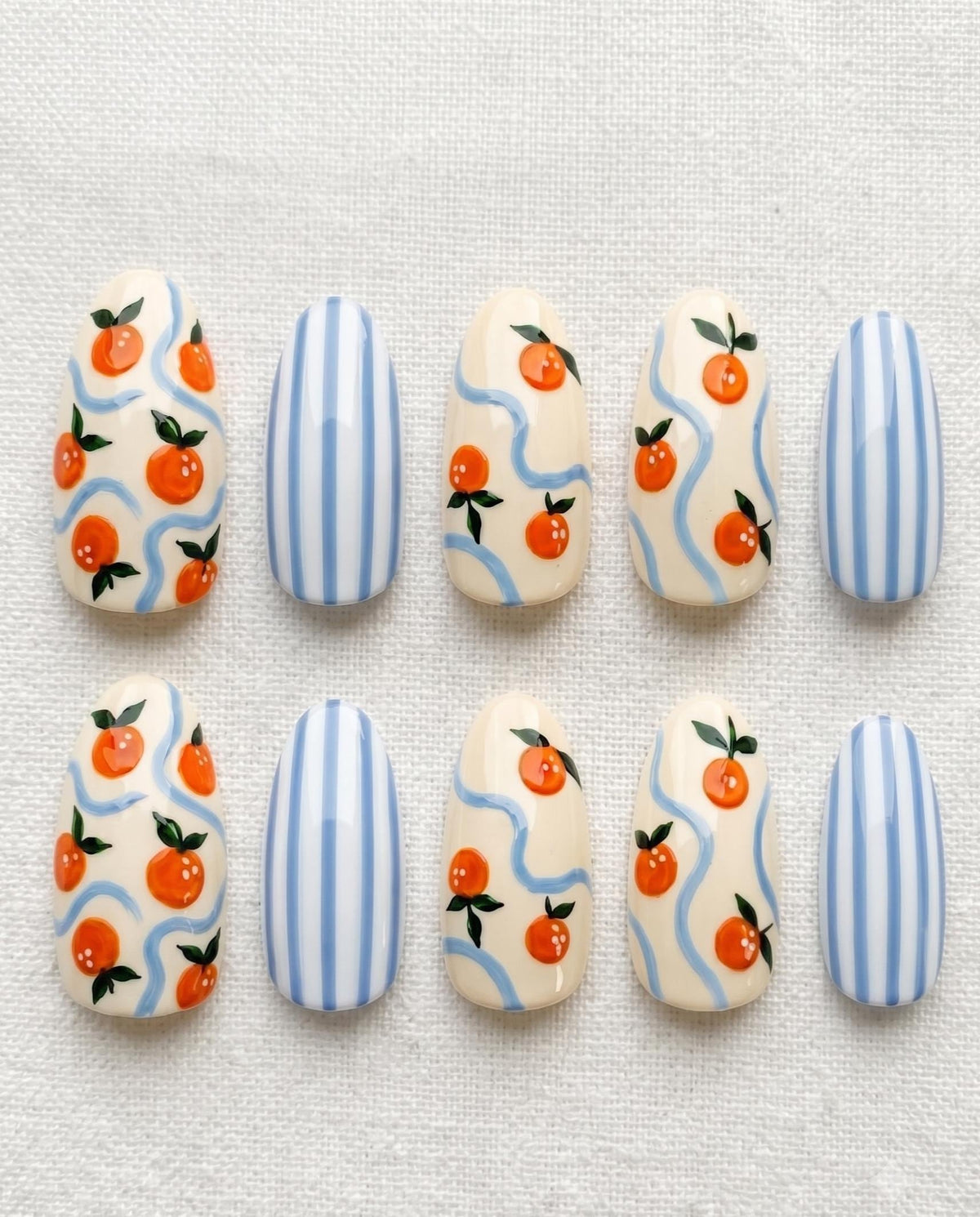 Orange Fruit and Blue Stripe Summer Press On Nails with Wavy Accents