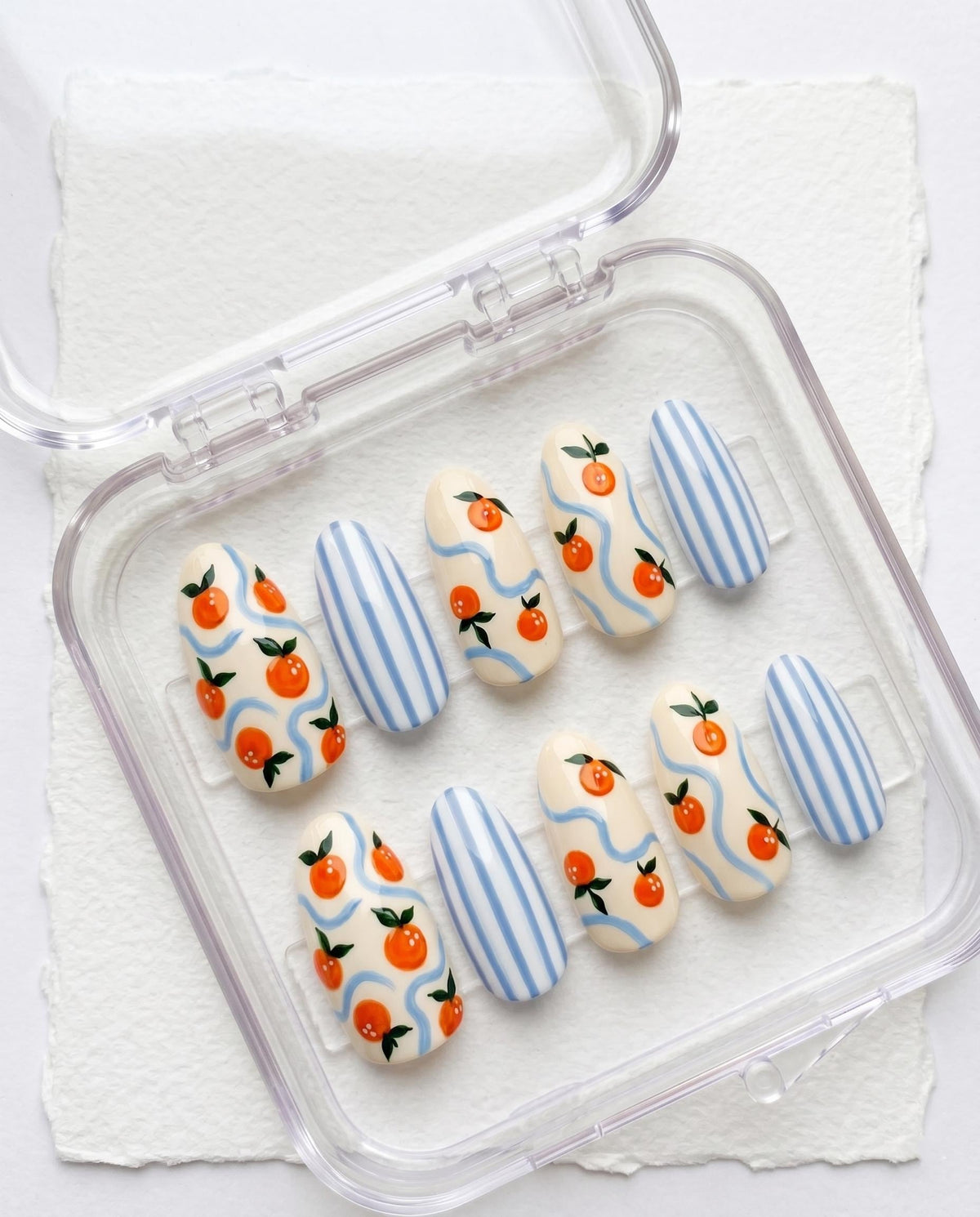 Orange Fruit and Blue Stripe Summer Press On Nails with Wavy Accents