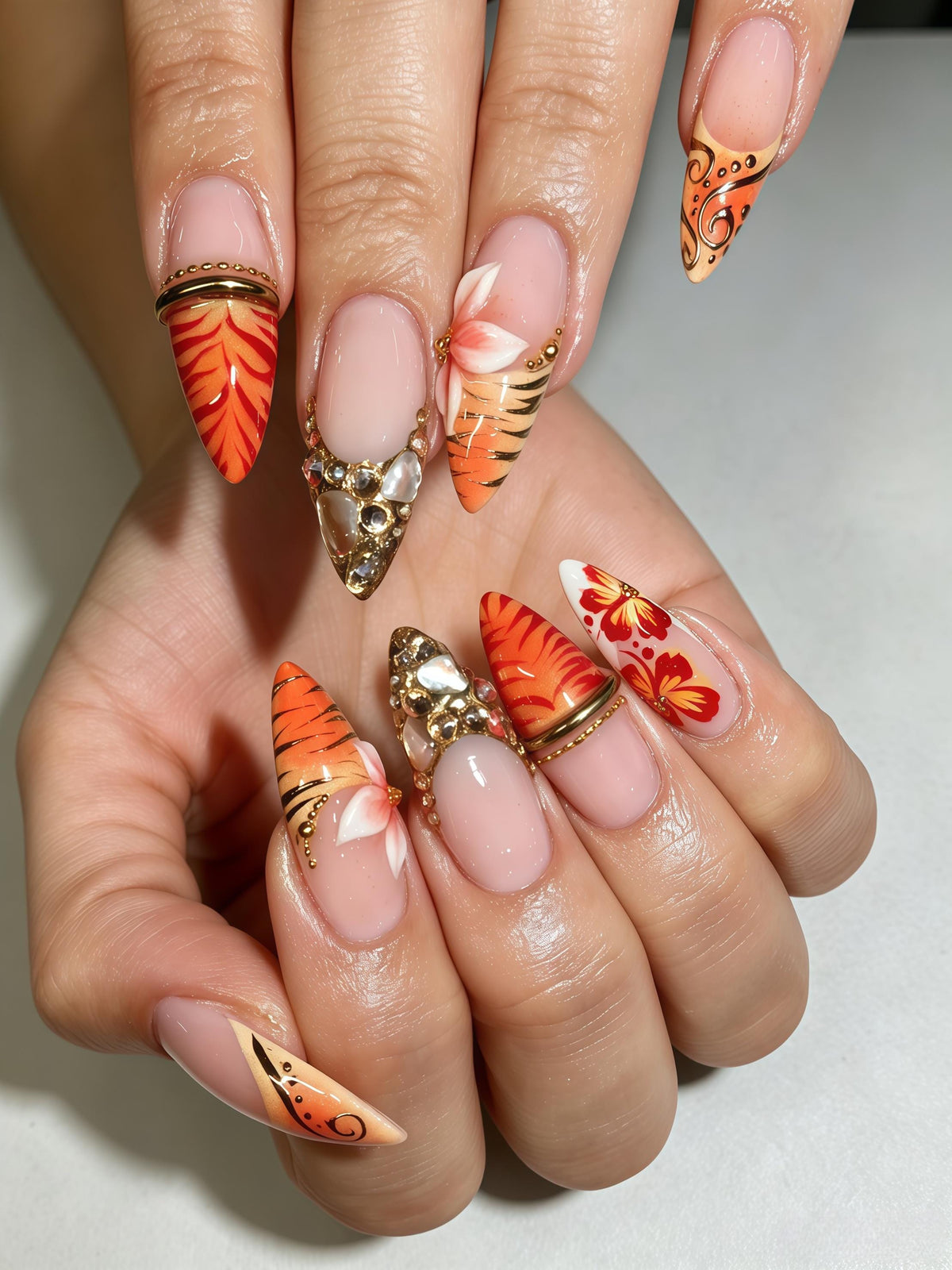 Orange Tiger Stripe Nails With Raised Flowers and Gold-Tone Stone Charms