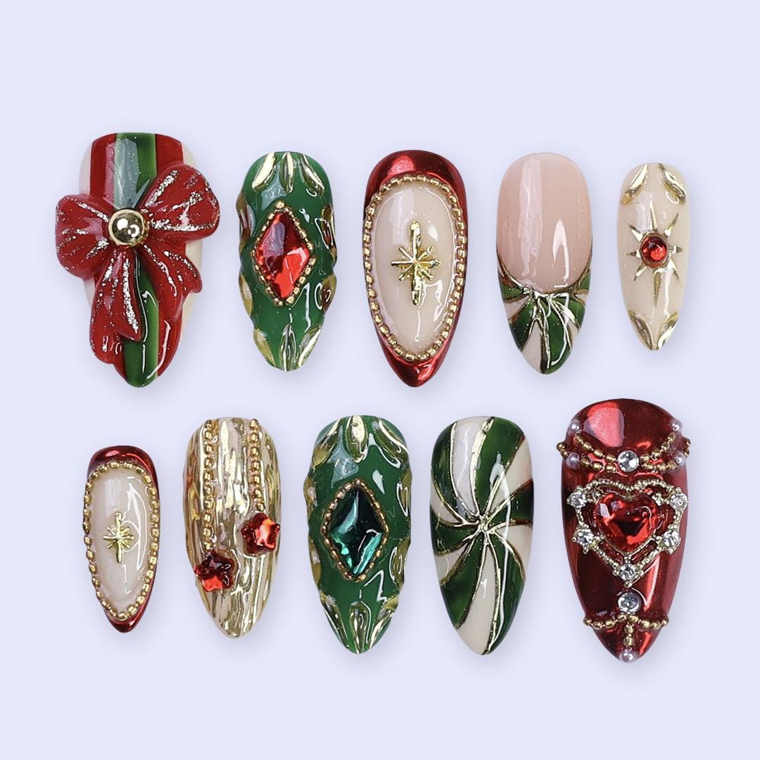 Ornate Christmas Press-On Nails With Red Bow, Emerald Gems and Gold Starbursts