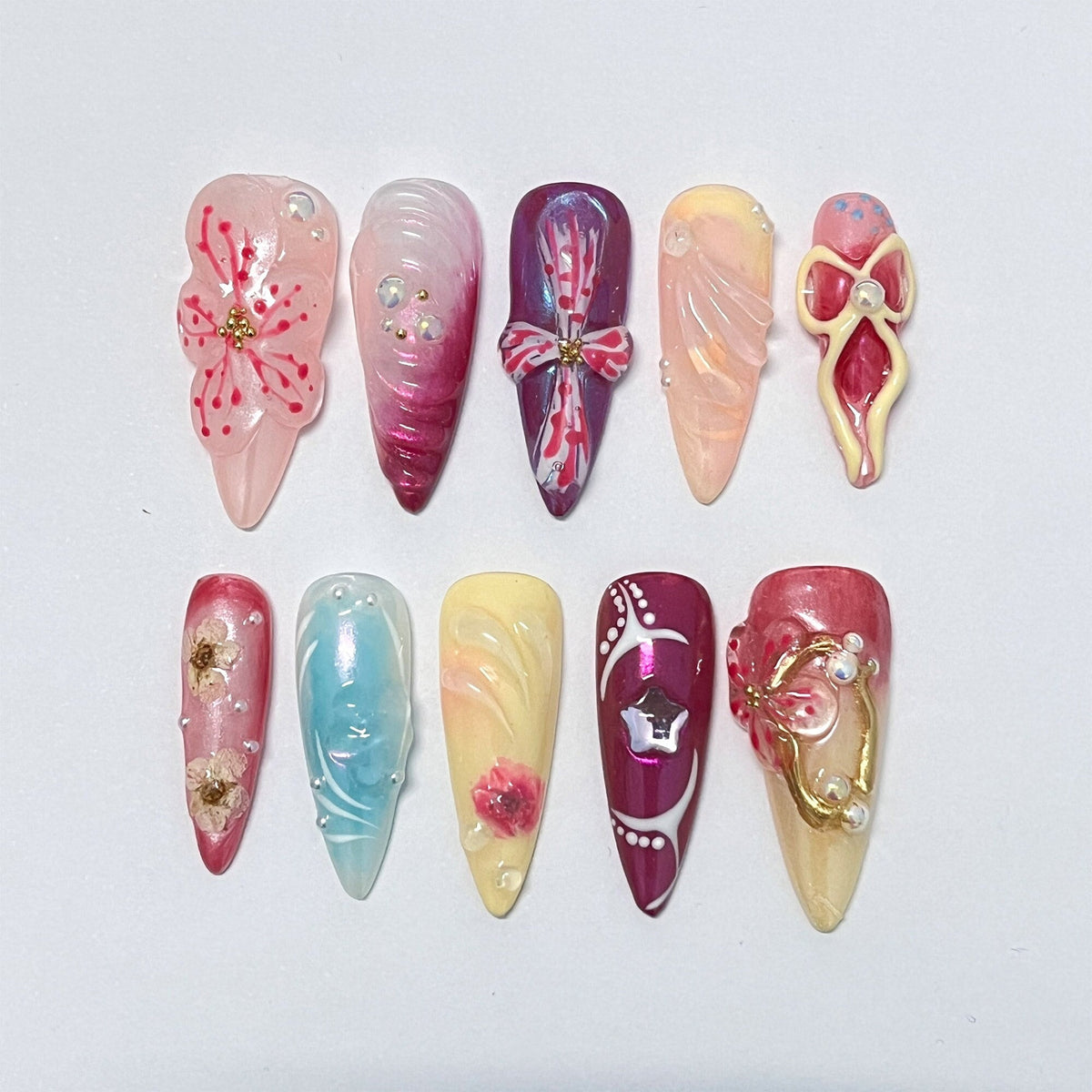 Ornate Spring Floral Nail Set With 3D Flowers, Bows, Gold Details, and Rhinestones