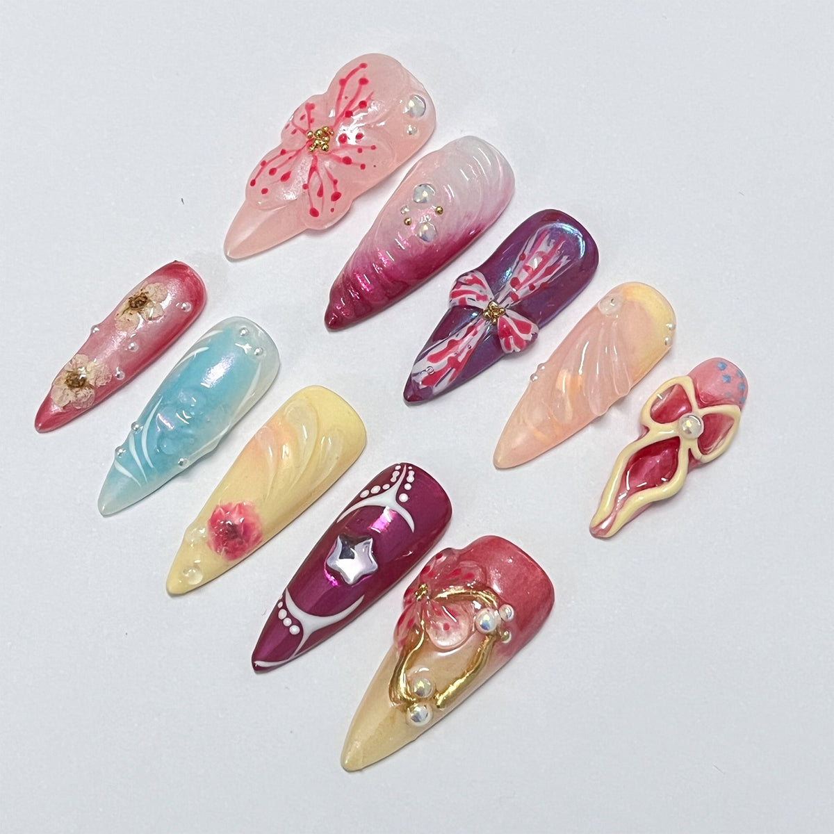 Ornate Spring Floral Nail Set With 3D Flowers, Bows, Gold Details, and Rhinestones
