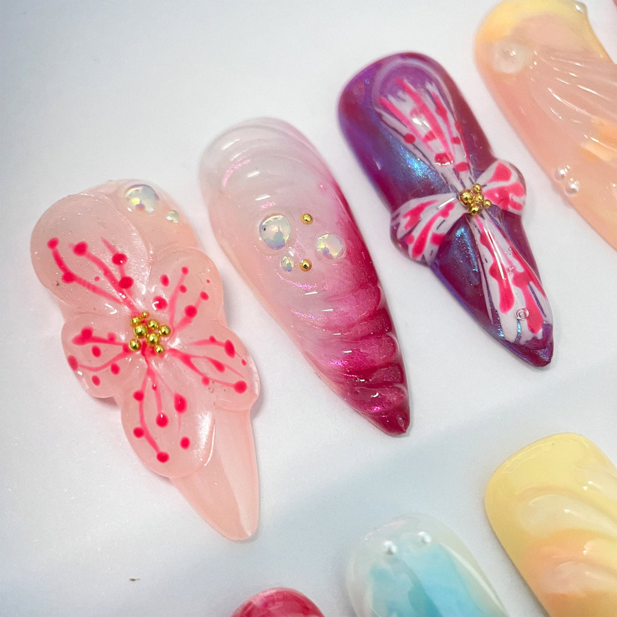 Ornate Spring Floral Nail Set With 3D Flowers, Bows, Gold Details, and Rhinestones