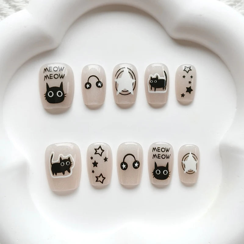 Pale Nude Pink Cat and Headphone Nail Set with Stars and Meow Lettering
