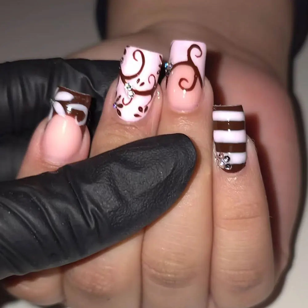Pale Pink French Tip Nails with Chocolate Brown Swirls, Stripes and Rhinestones