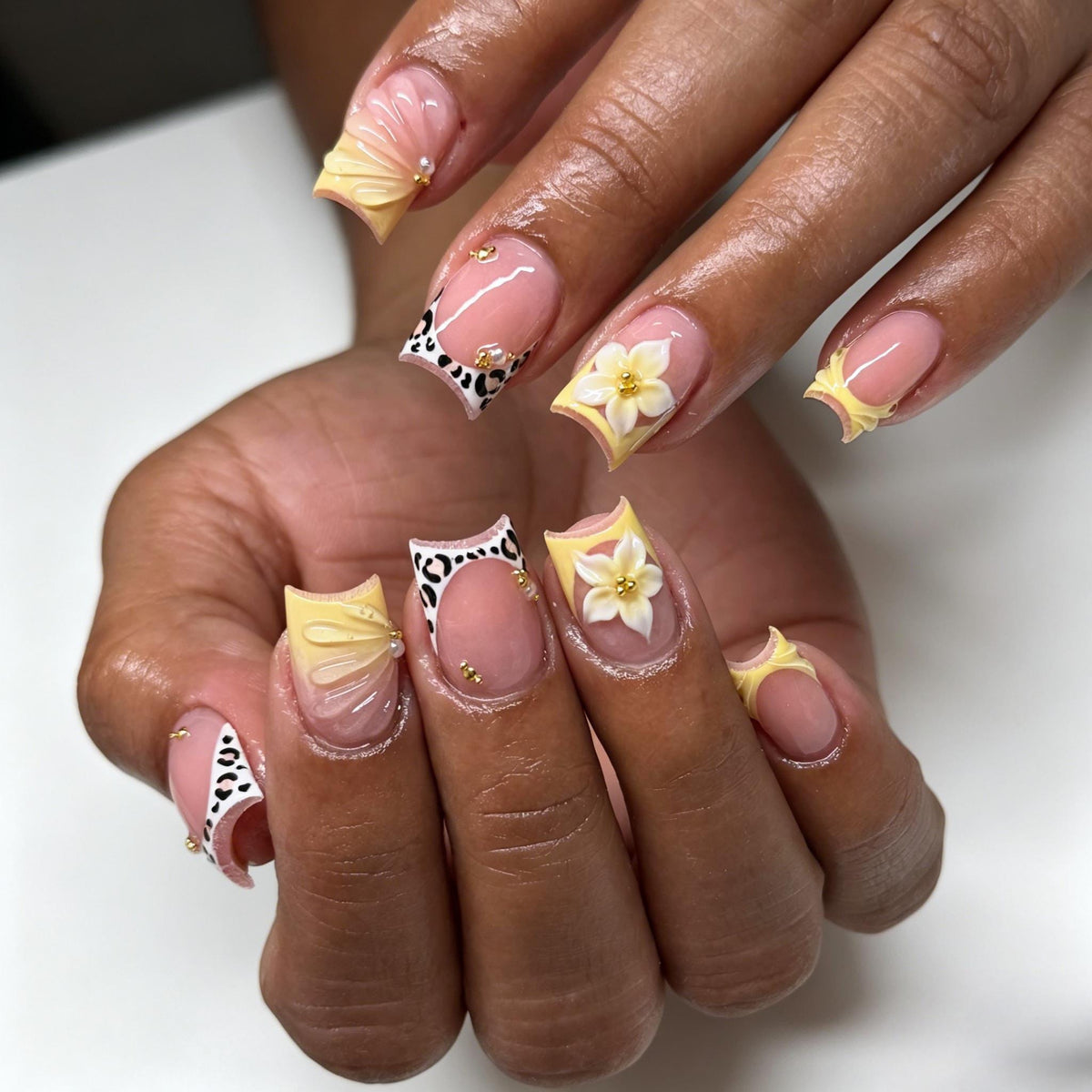 Pale Yellow French Tip Nails With Leopard Spots and 3D Floral Accents