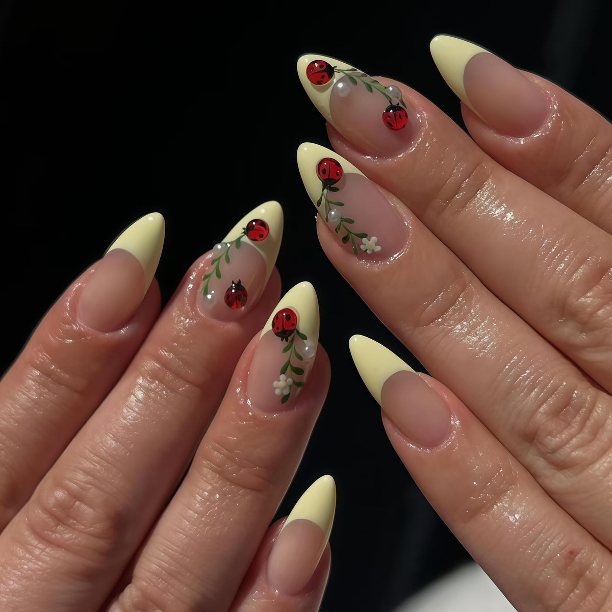 Pale Yellow French Tip Nails with Raised Ladybugs, Green Vines, and White Flowers