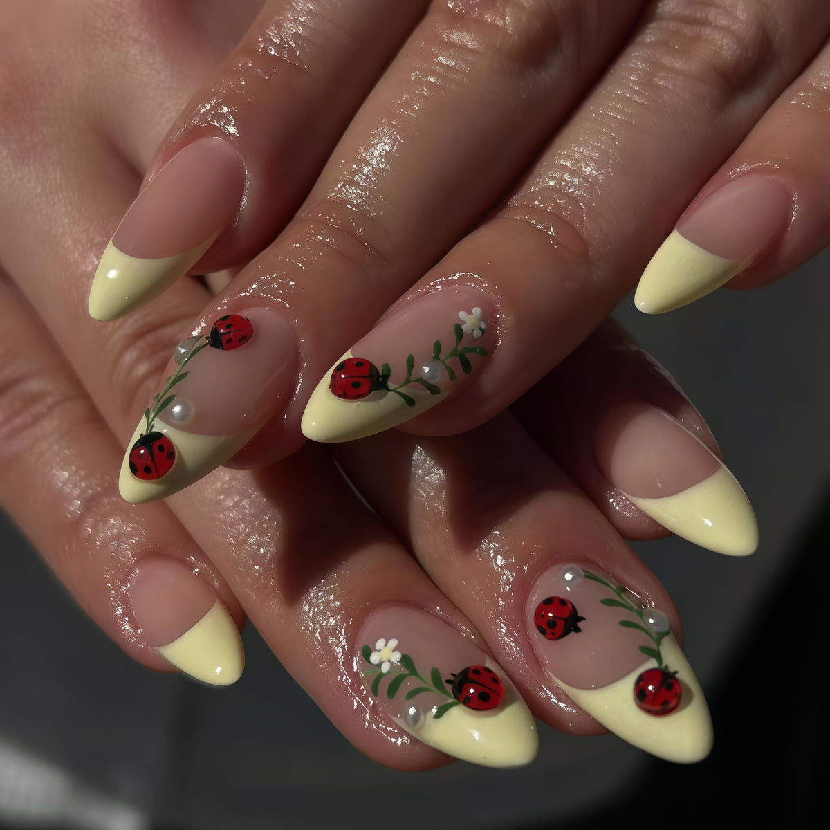 Pale Yellow French Tip Nails with Raised Ladybugs, Green Vines, and White Flowers