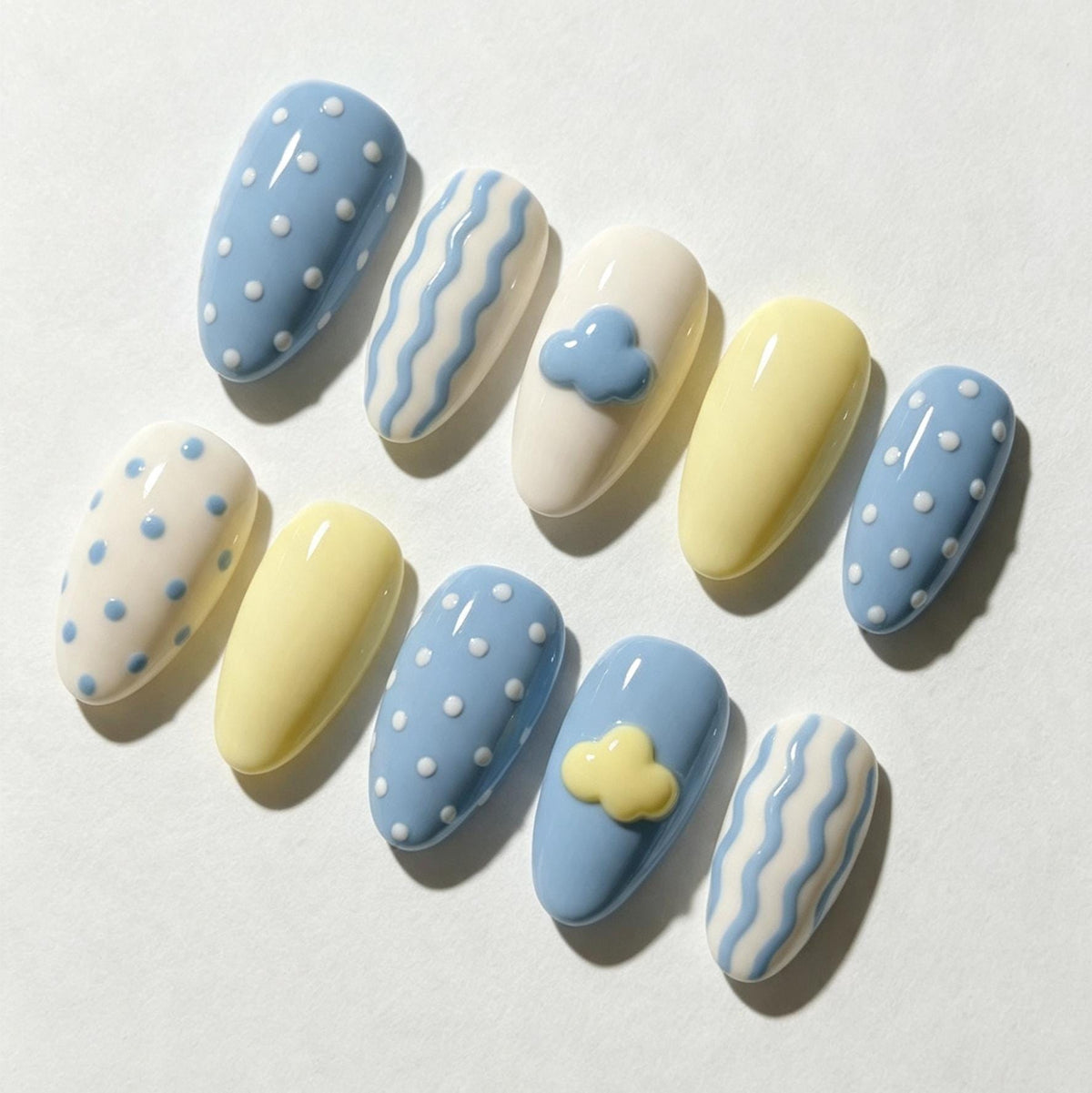 Pastel Blue and Yellow Cloud, Dot, and Wavy Stripe Nail Set