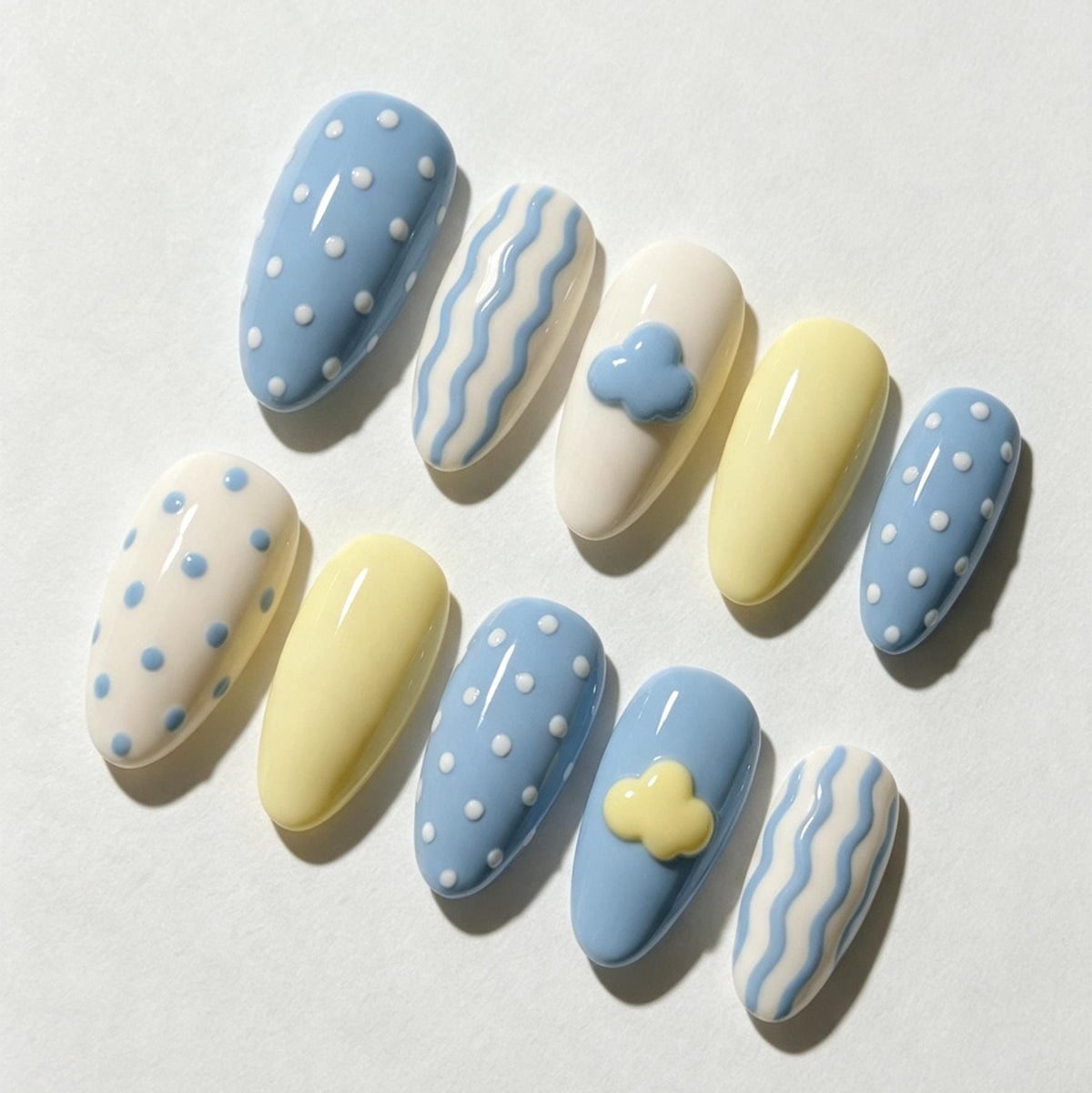 Pastel Blue and Yellow Cloud, Dot, and Wavy Stripe Nail Set