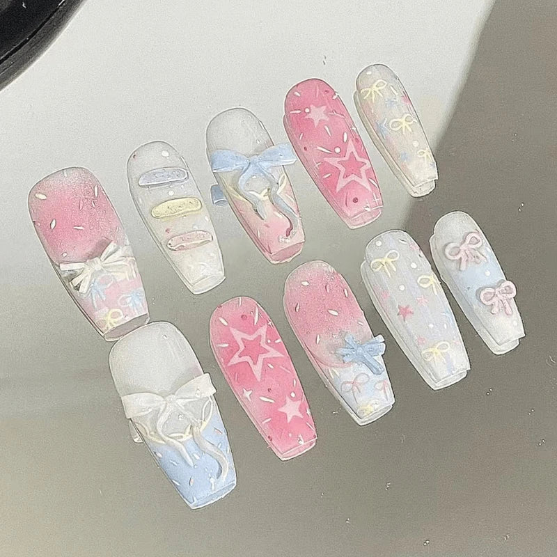 Pastel Pink and Blue Bow Nails with Stars, Speckles and Marble