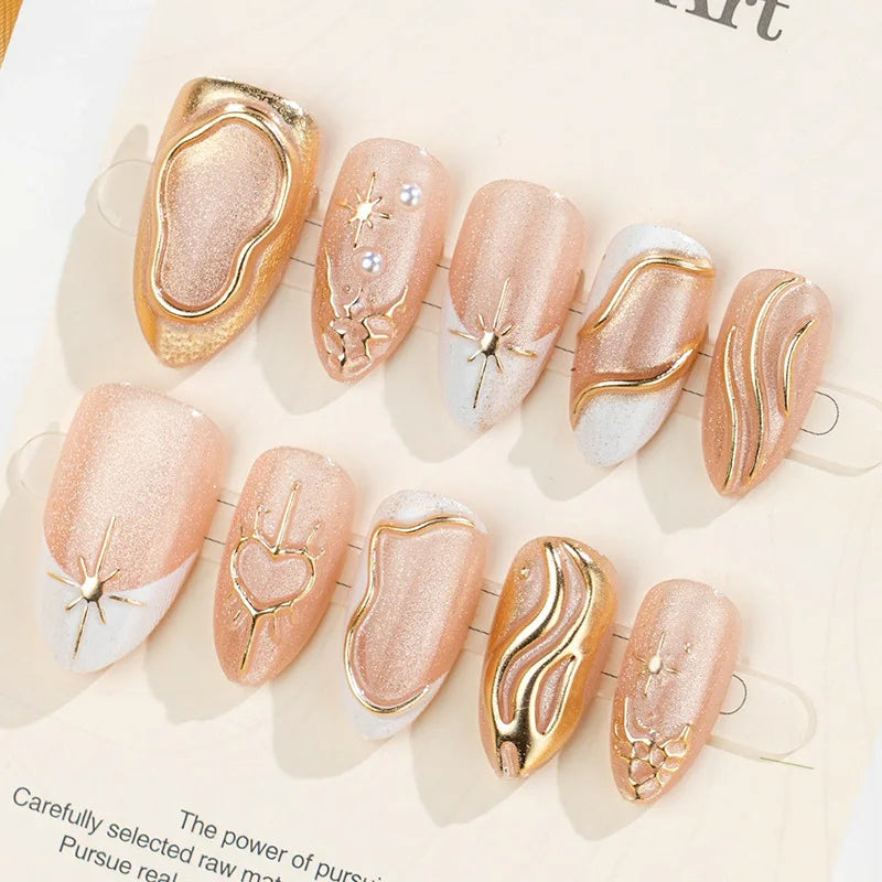 Peach Pink Shimmer Nails with Raised Gold Swirls, Flowers and Rhinestone Accents