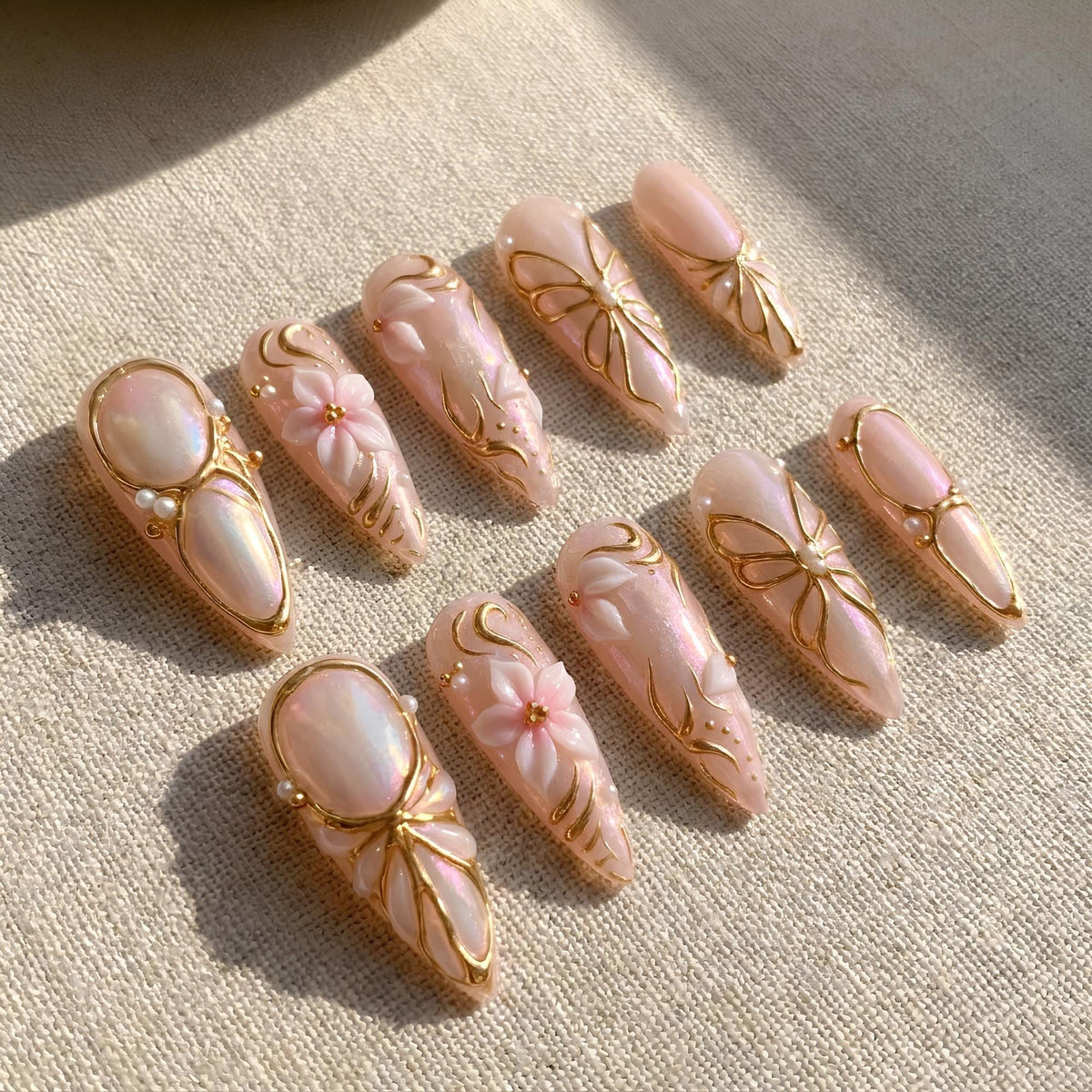 Pearlescent Pink Press On Nails with Gold Florals, Bow Details and Pearls