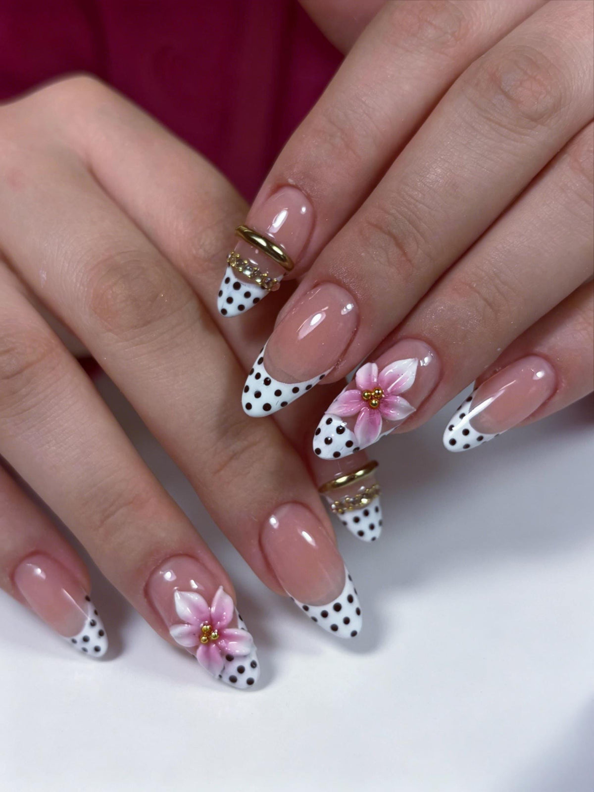 Pink 3D Flower French Tip Nails With Black Polka Dots and Gold Details