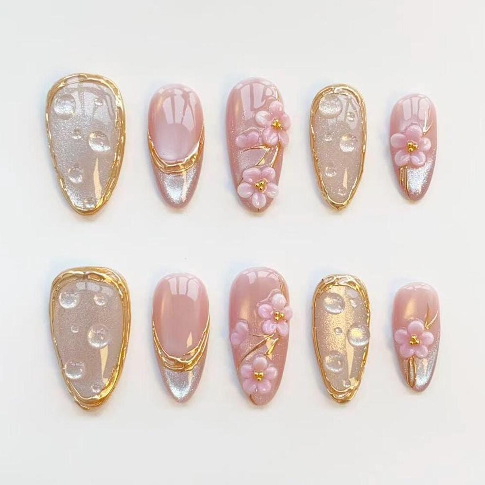 Pink 3D Flower Nails with Gold Accents and Silver Cat-Eye Glitter