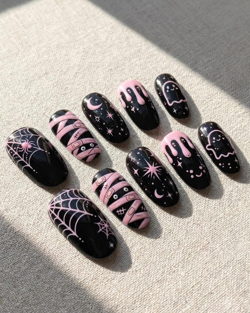 Pink and Black Halloween Nail Set With Spiders, Mummies, Moons and Ghosts