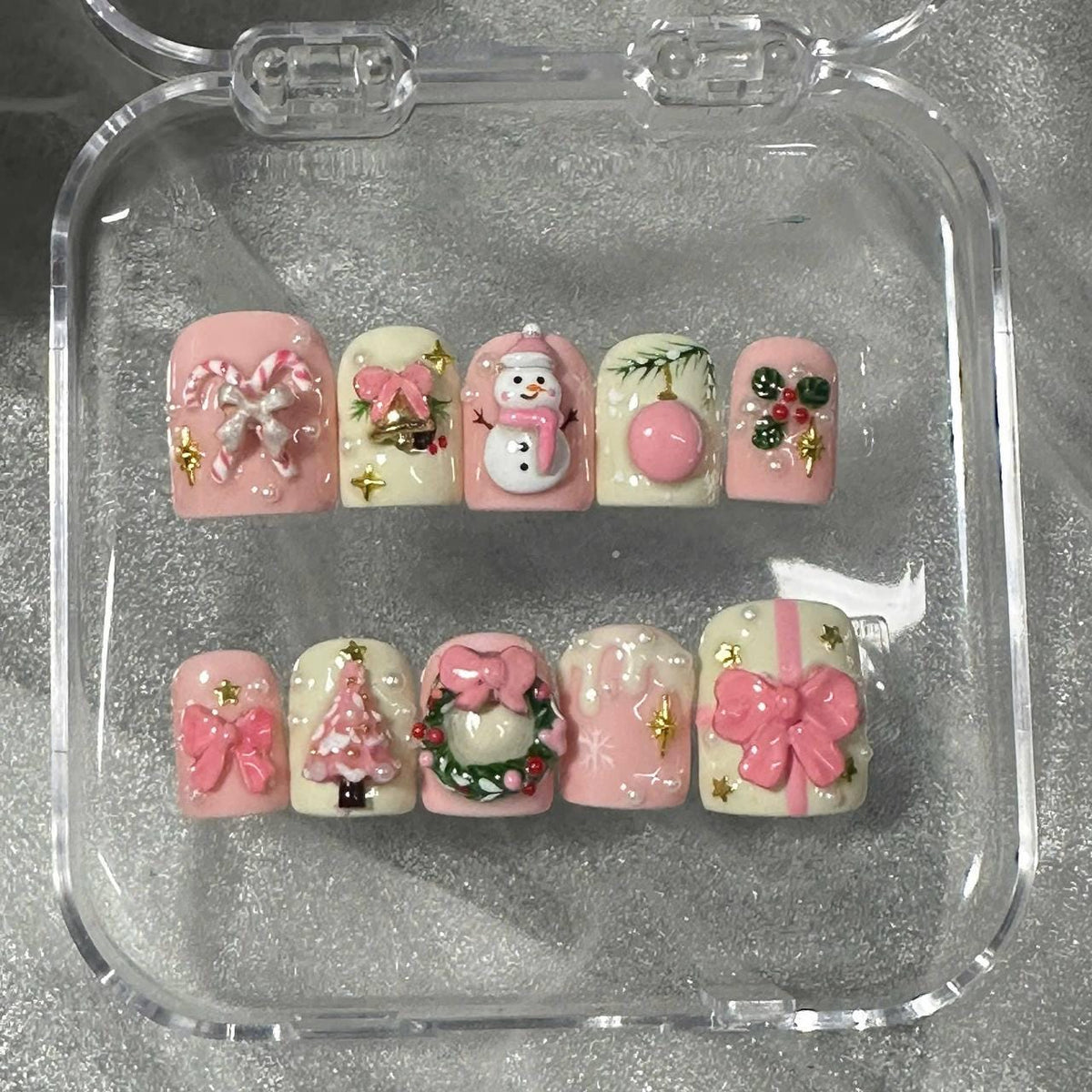 Pink and Ivory Christmas Nails With Snowmen, Trees, Wreaths, and 3D Bows