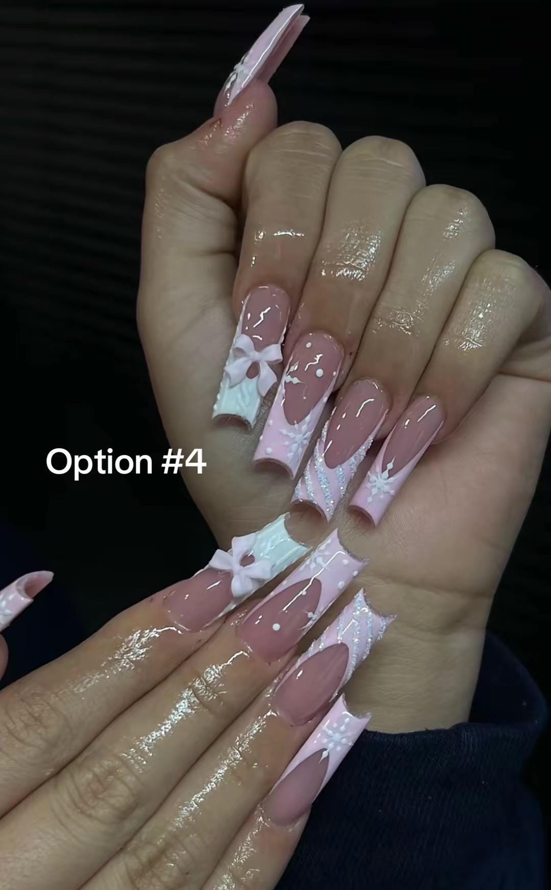 Pink and Mauve Christmas & Winter Nail Designs with Bows, Snowflakes and Gold Accents