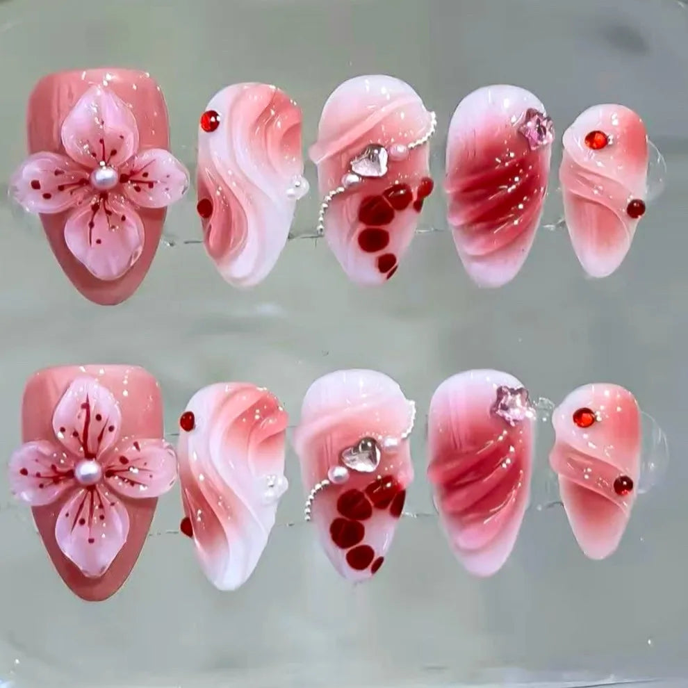 Pink Blossom Press On Nails with Pearl Centers, Red Swirls and Gem Accents