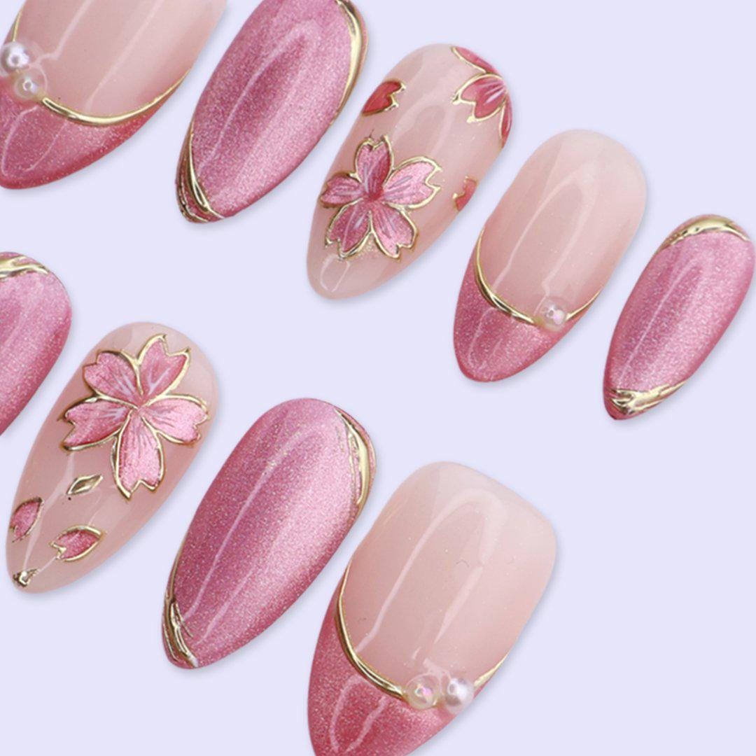 Pink Cat Eye Nails with Gold Floral Art and Pearl Accents for Spring and Weddings