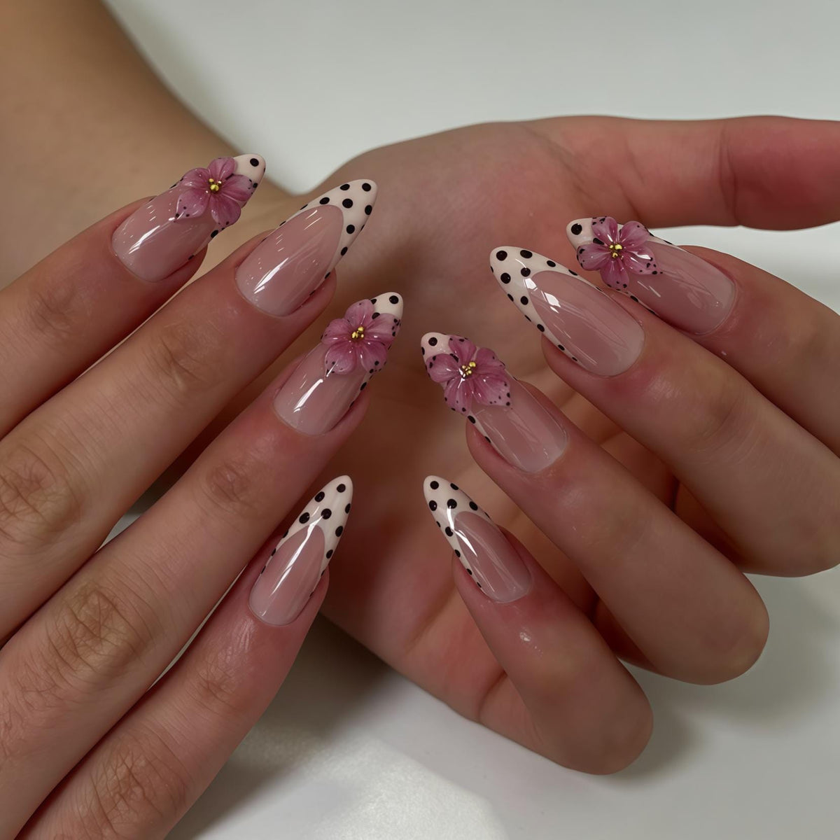 Pink Cherry Blossom Nails with Black Polka Dots and French Tips