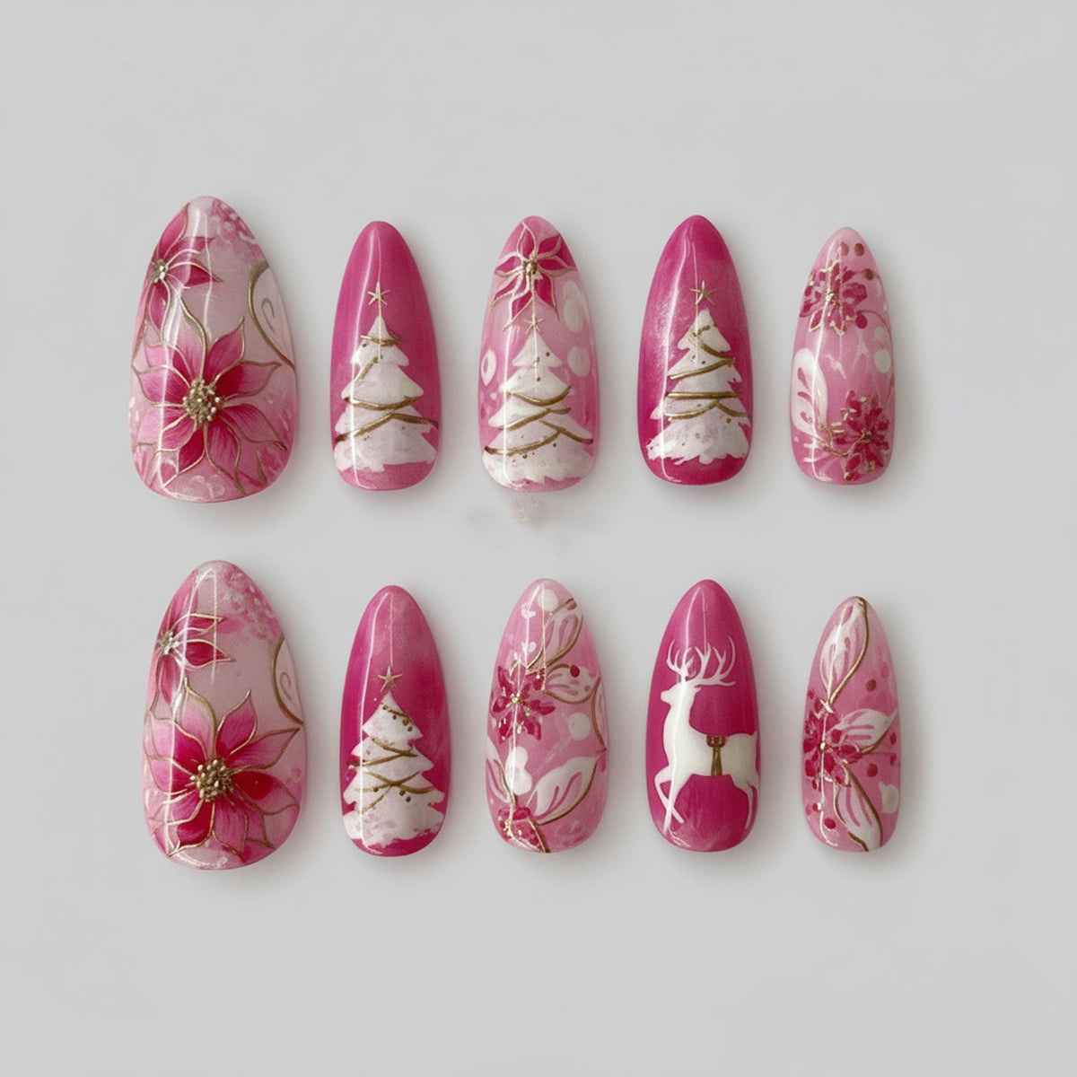 Pink Christmas Press-On Nails With Gold Trees, Reindeer and Poinsettias