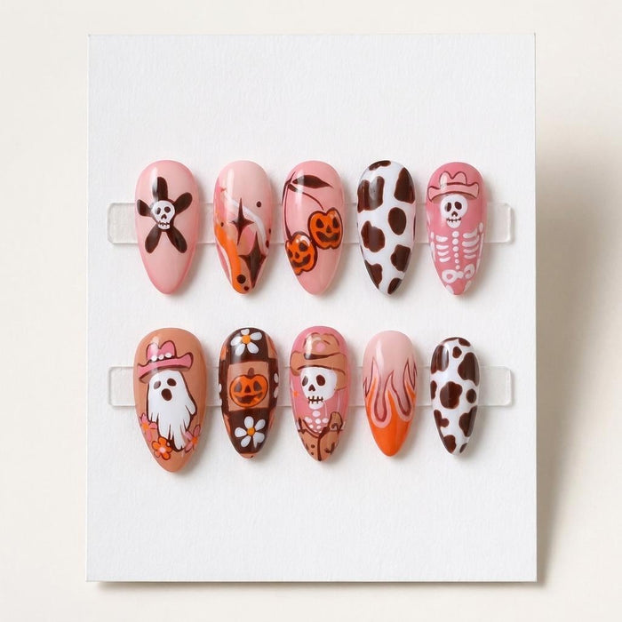 Pink Cowgirl Halloween Press On Nails With Ghosts, Pumpkins, Skulls, and Cow Print