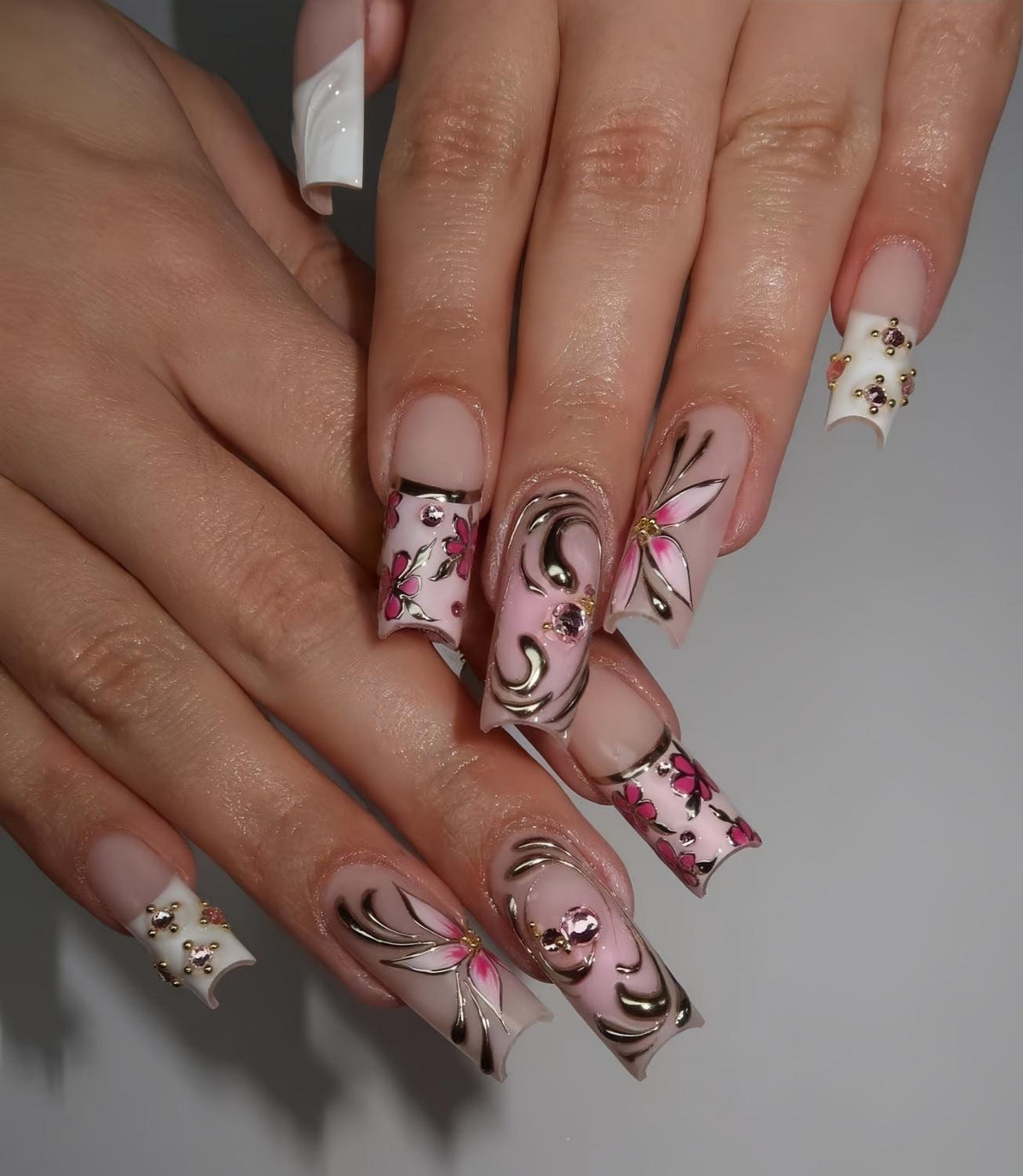 Pink Floral French Tip Nails with Raised Silver Chrome Swirls and Rhinestones