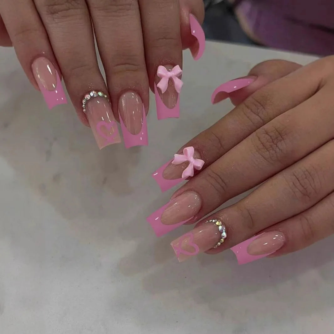Pink French Tip Nails with 3D Bows and Rhinestones