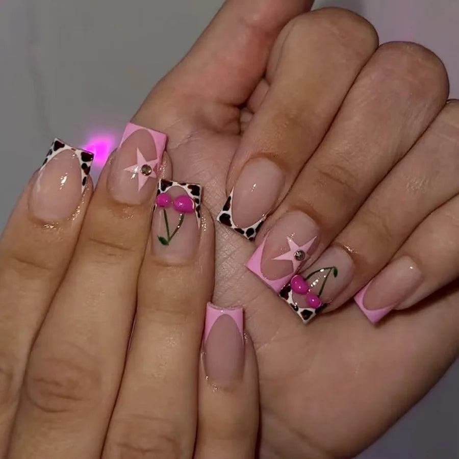 Pink French Tip Nails With Black-and-White Animal Print and 3D Cherries