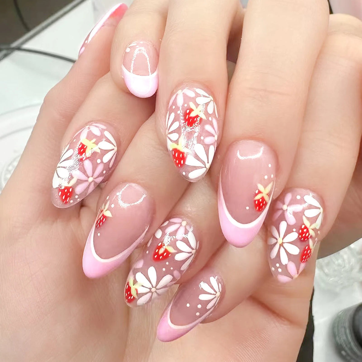Pink French Tip Nails With Daisy Flowers and Strawberry Accents