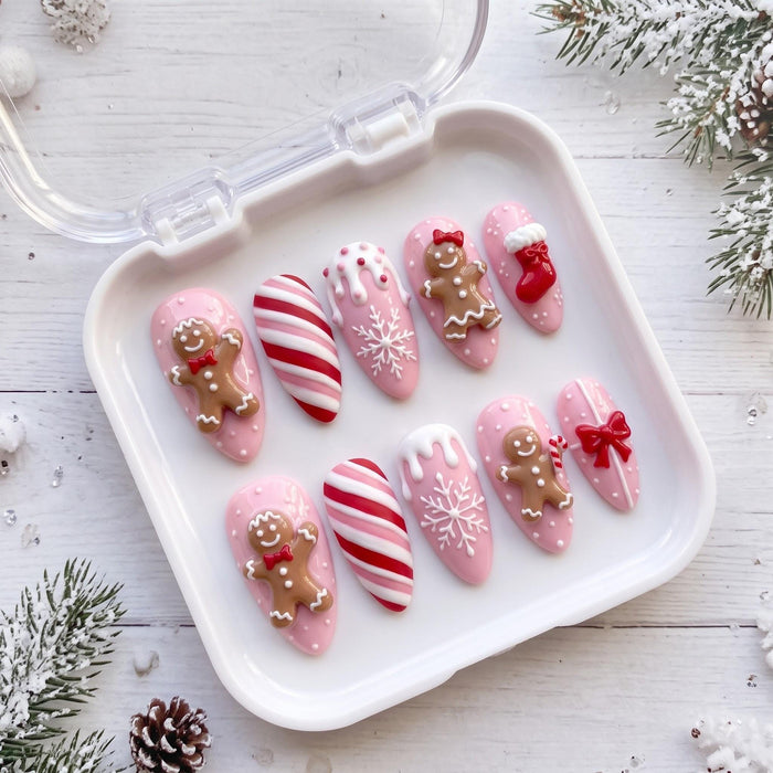 Pink Gingerbread Christmas Press On Nails With Candy Cane Stripes, Snowflakes, Stockings and Bows