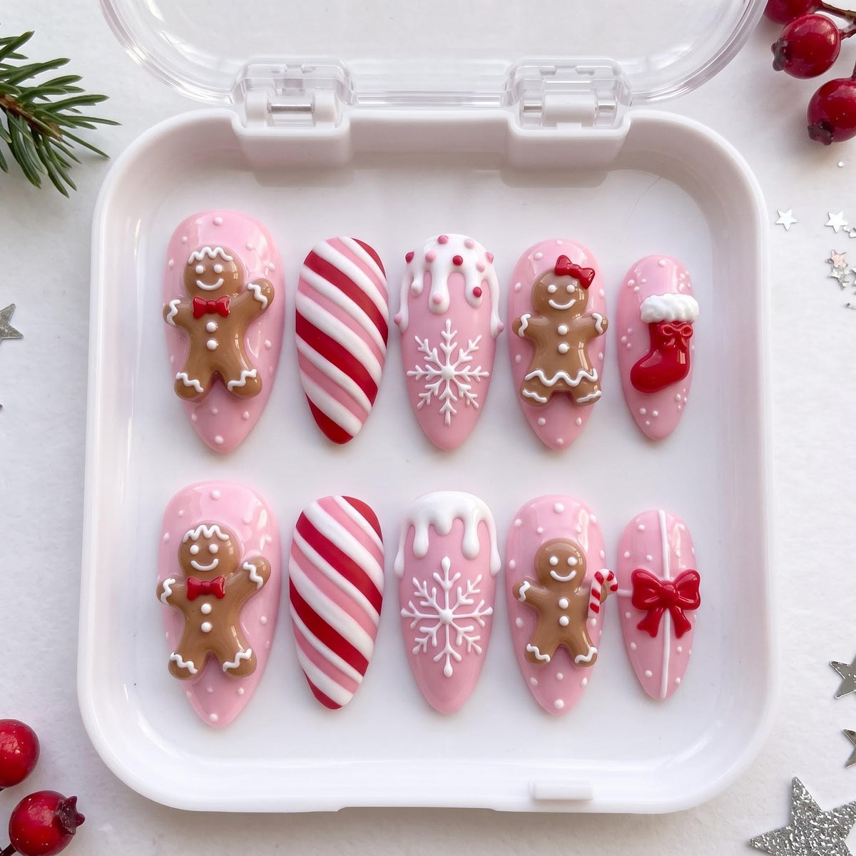 Pink Gingerbread Christmas Nails With Candy Cane Stripes, Snowflakes, Stockings and Bows