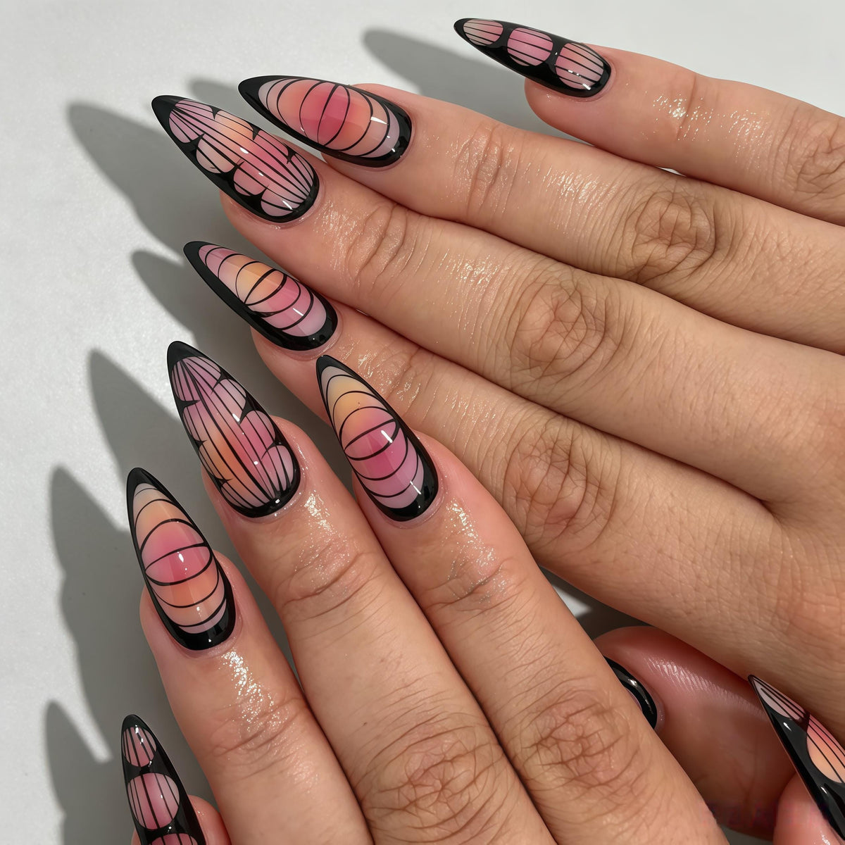 Pink Gradient Nails With Black Geometric Outlines