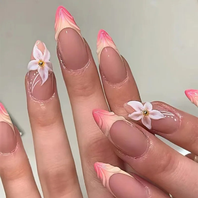 Pink Marble French Tip Nails with Raised White Flowers and Gold Centers