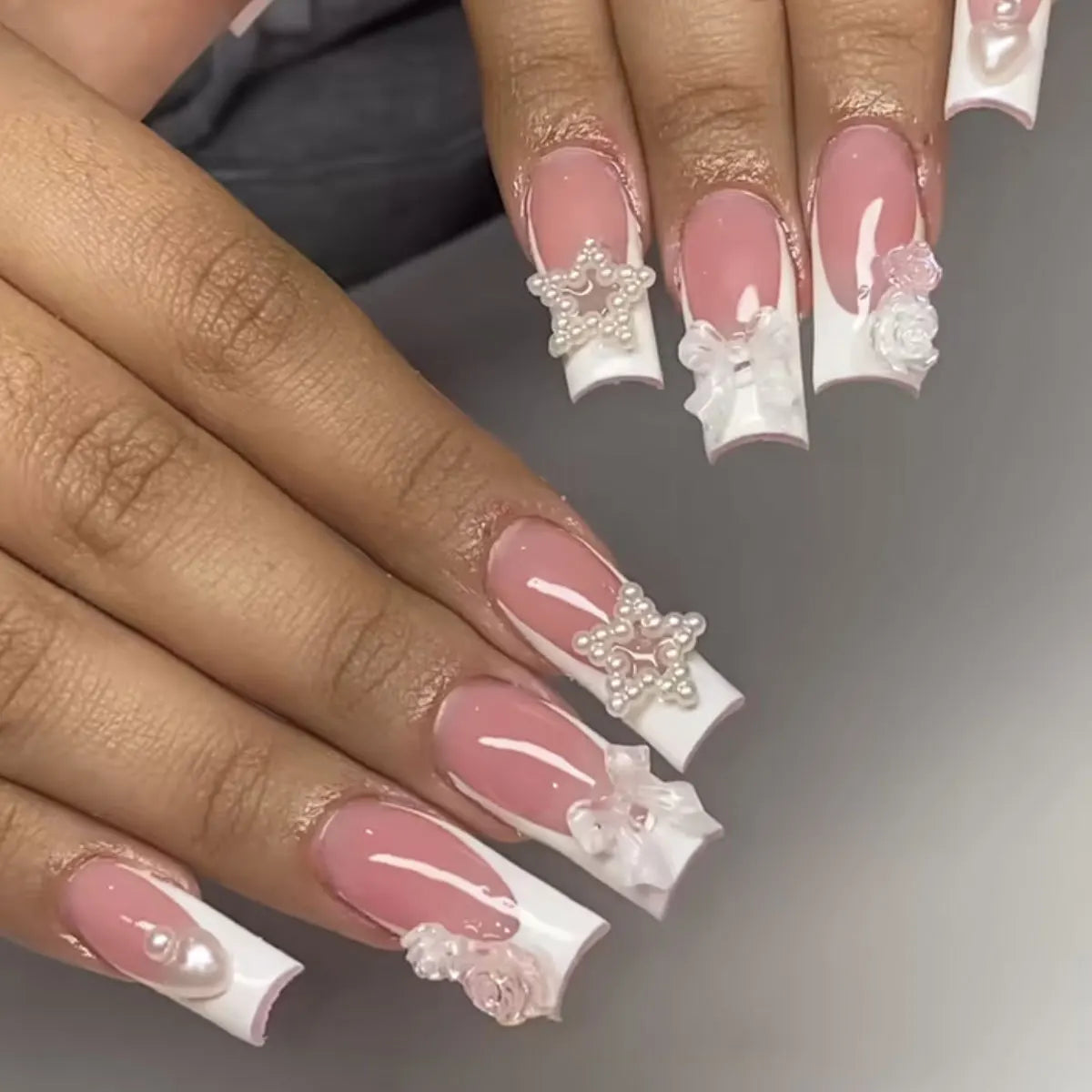 Pink Nude French Tip Nails with 3D White Bows and Pearl Accents