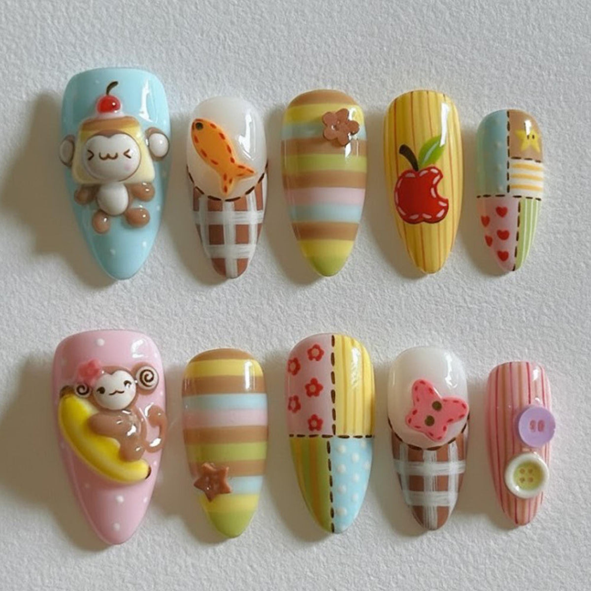 Playful Monkey and Fruit 3D Nail Set With Pastel Stripes and Checks