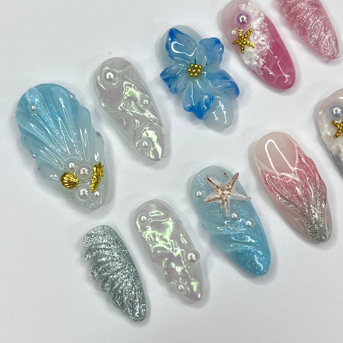 Mermaid-Inspired Summer Ocean Nails with 3D Shells, Flowers, and Starfish