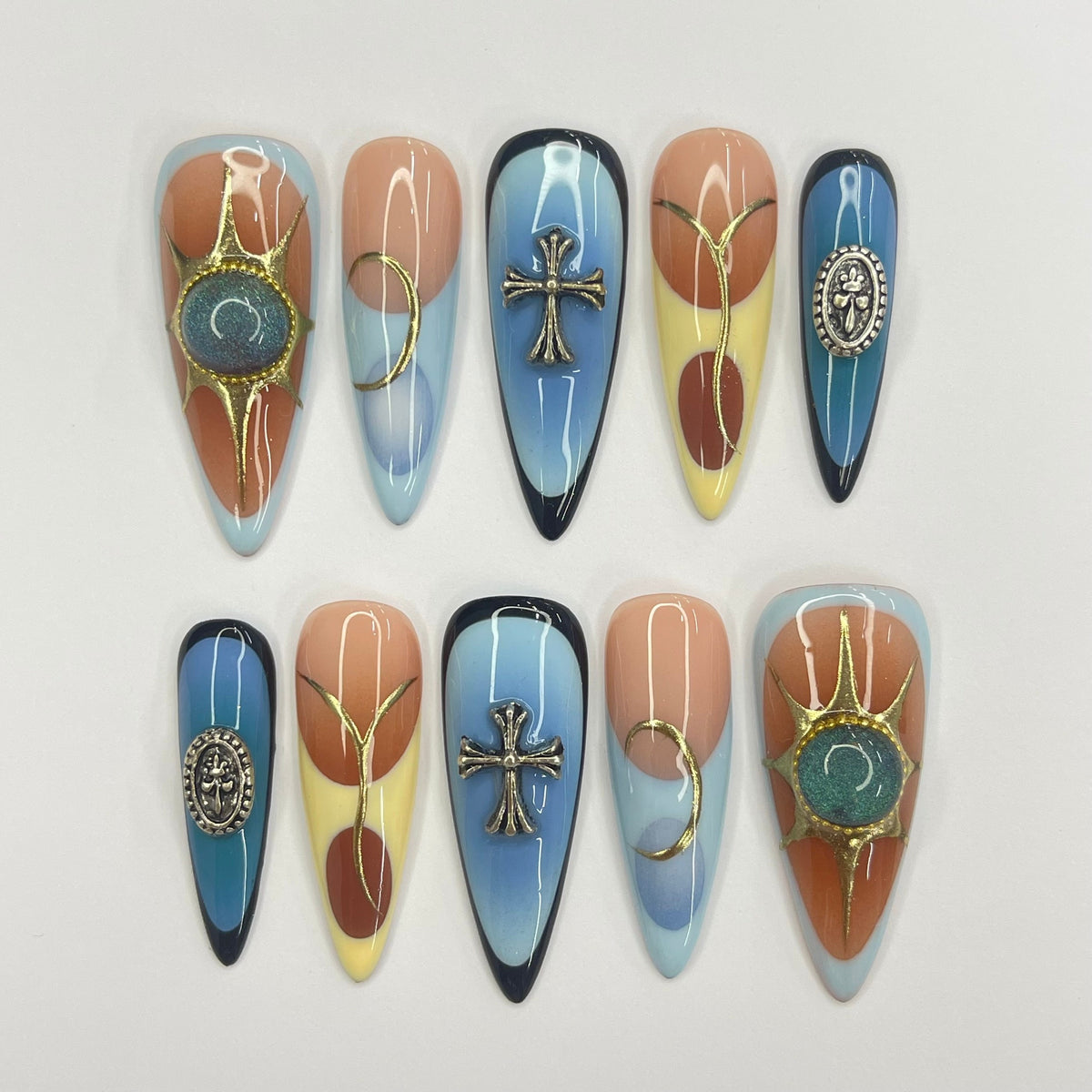 Summer Blue and Terracotta Nails with Gold-Tone Medallions